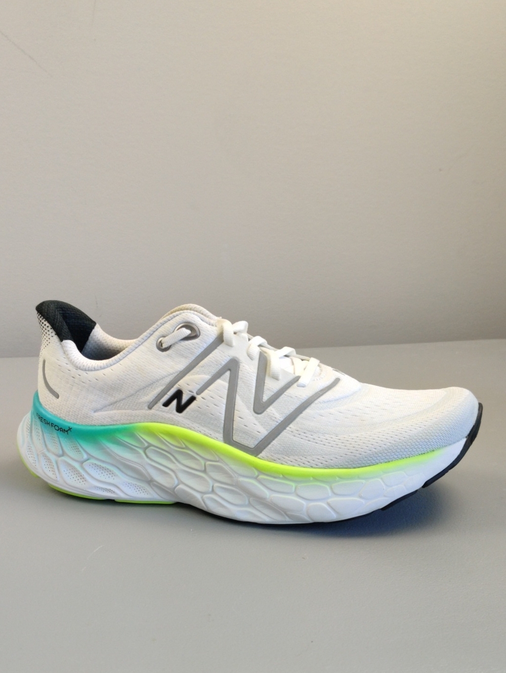 New Balance White Running Sneakers with Neon Green and Teal Accent